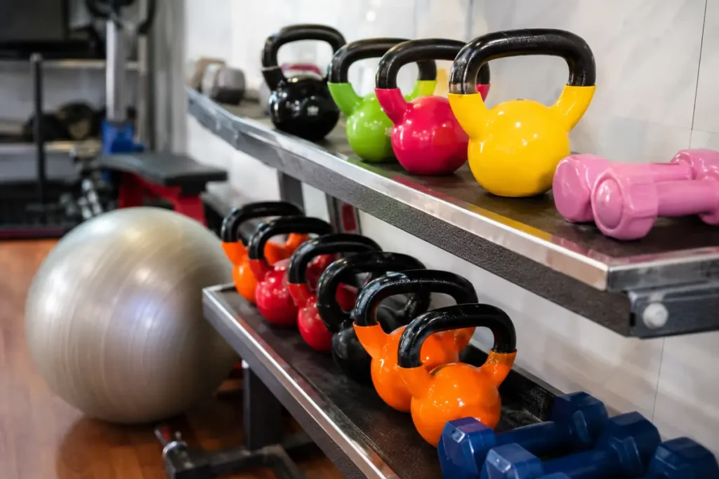 Kettlebells and free weights at Arya Fitness Gym, Sant Nagar