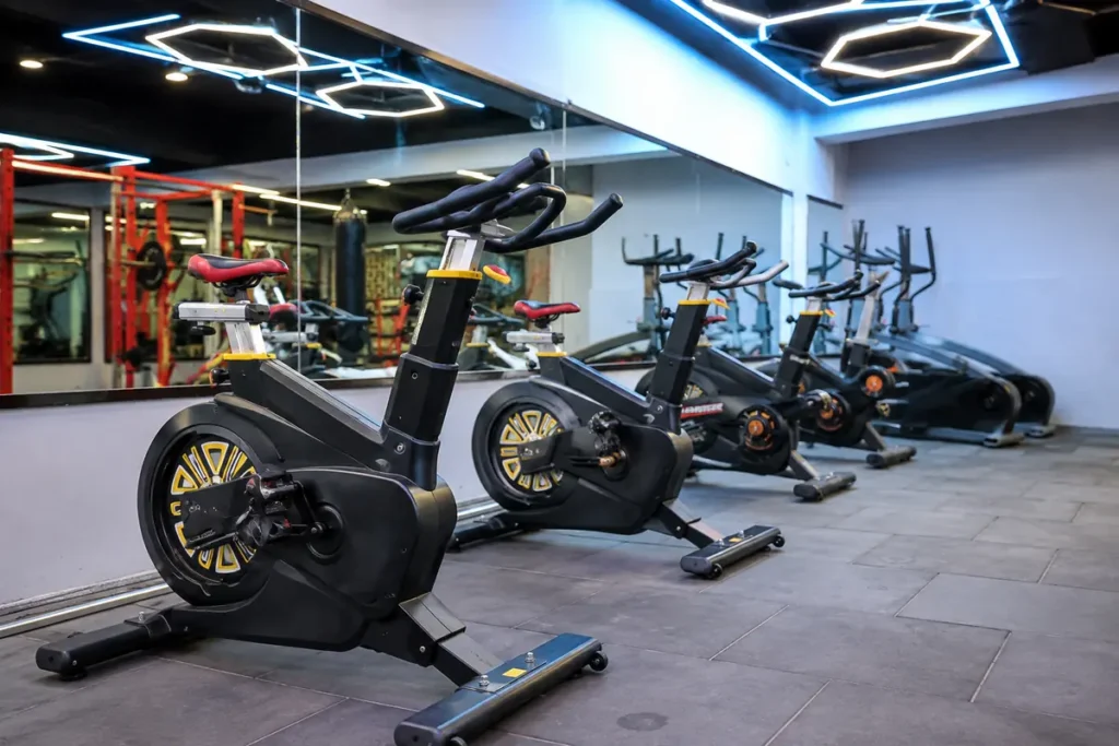 Indoor cycling studio at Arya Fitness Gym, Harit Vihar, Delhi