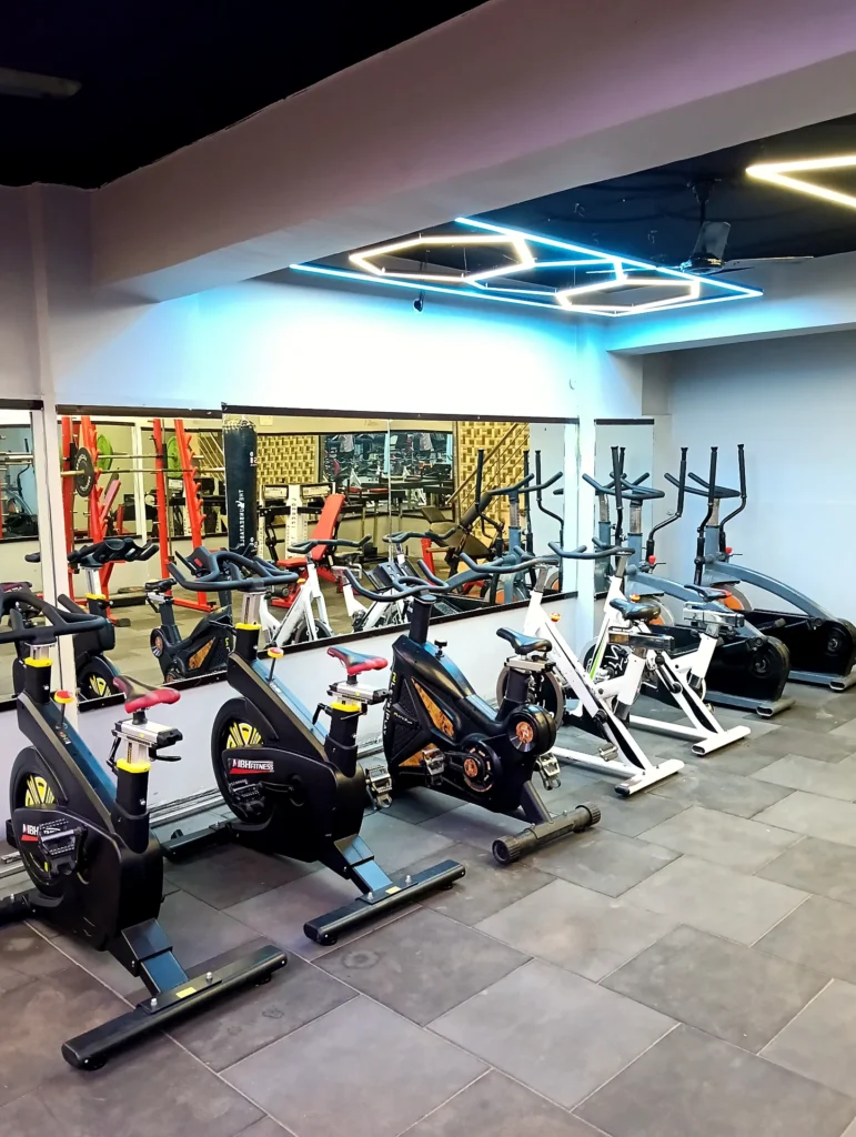 Indoor exercise bikes for cardio cycling workouts at Arya Fitness